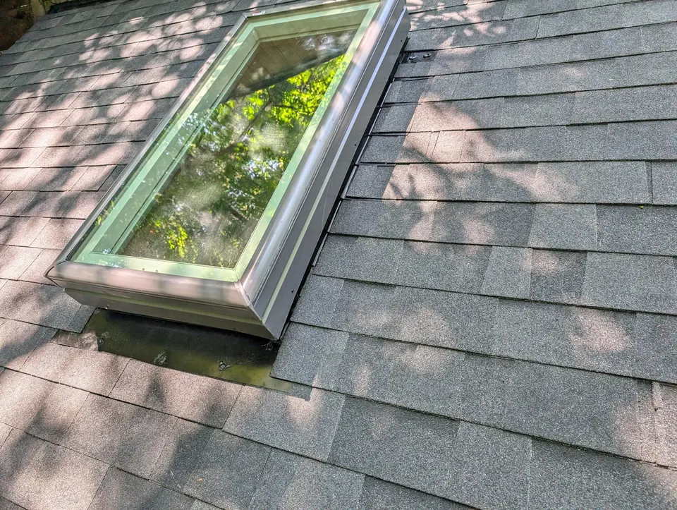 Close-up of a new skylight installation by Rain or Shine Roofing