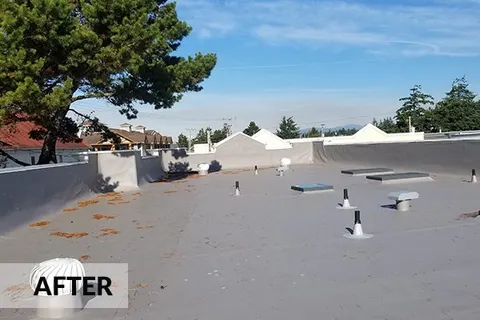 Commercial roof after replacement by Rain or Shine Roofing